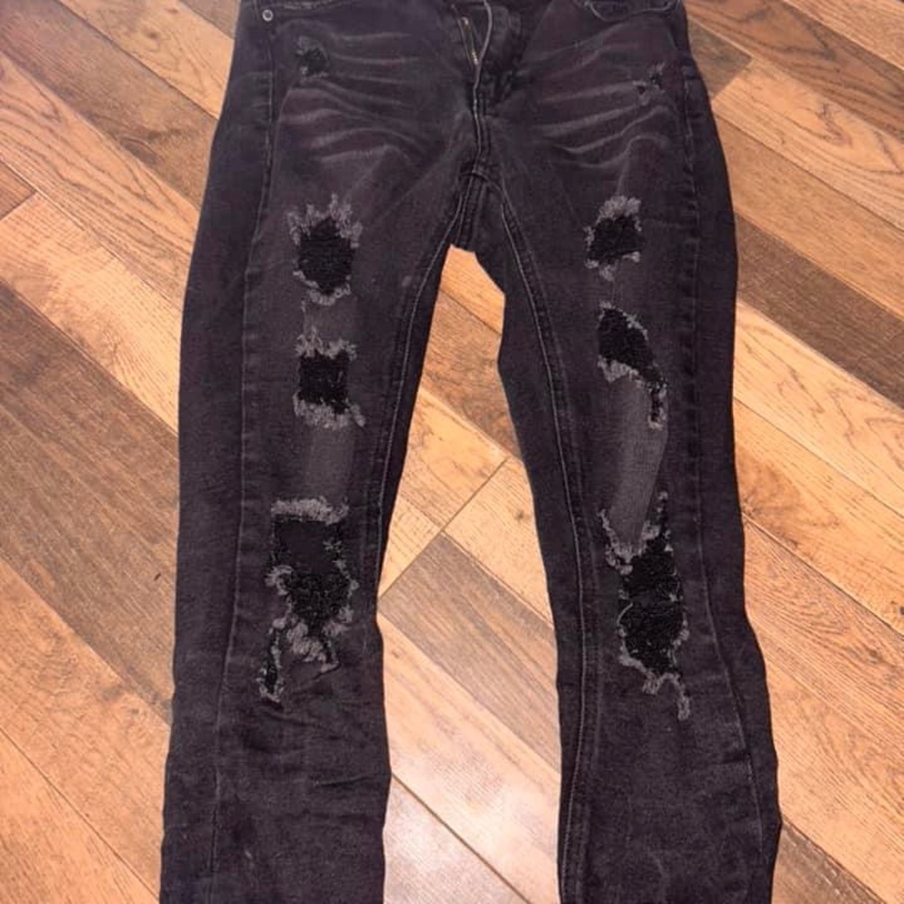 Black distressed jeans